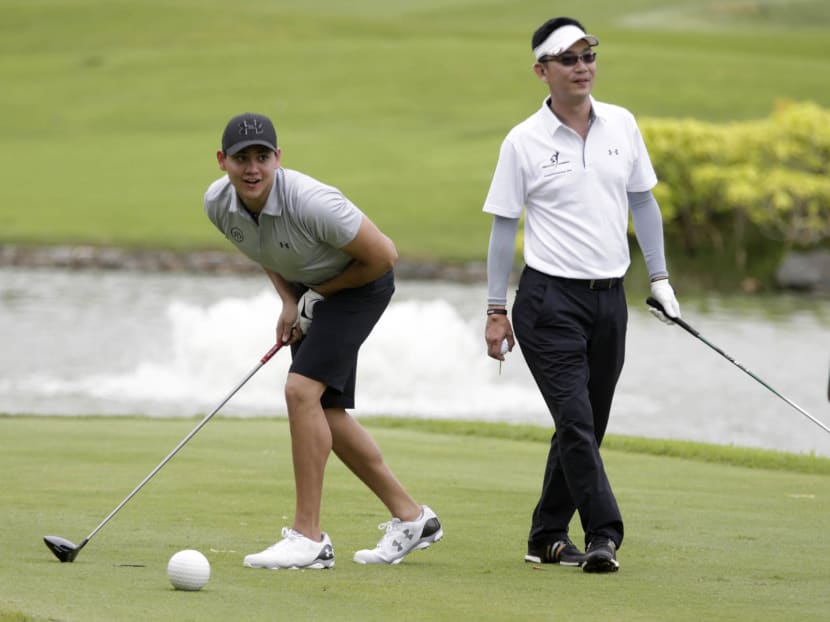 Joseph Schooling (L) during the Singapore Swimming Association Inaugural Fundraiser 2016 opening tee-off at Tanah Merah Country Club Garden Course on Tuesday (Nov 22). Photo: Wee Teck Hian/TODAY Joseph Schooling (L) during the Singapore Swimming Association Inaugural Fundraiser 2016 opening tee-off at Tanah Merah Country Club Garden Course on Tuesday (Nov 22). Photo: Wee Teck Hian/TODAY