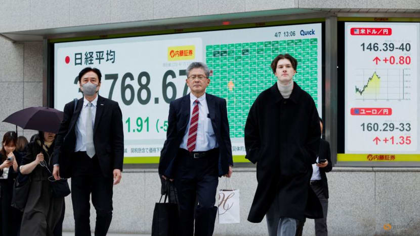 Japan's Nikkei sinks to 1-1/2-year low as bank shares tumble Japan's Nikkei sinks to 1-1/2-year low as bank shares tumble