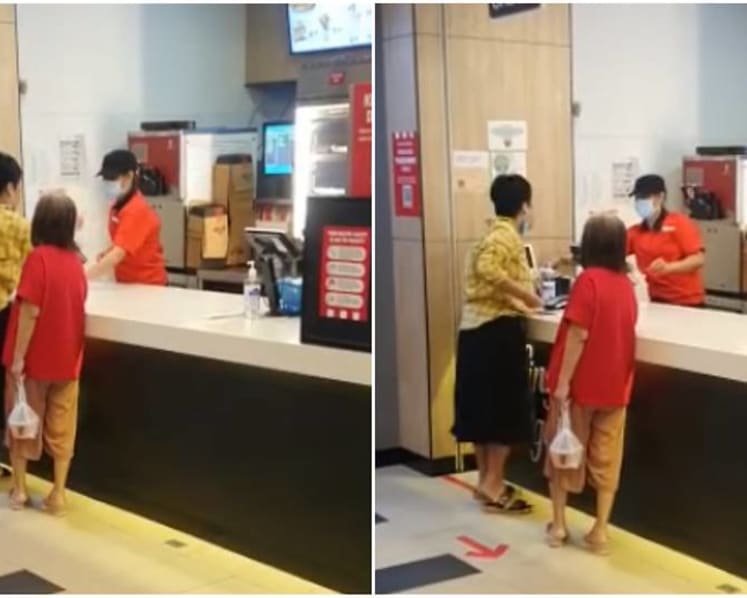 Woman charged over KFC spitting incident, intends to claim trial