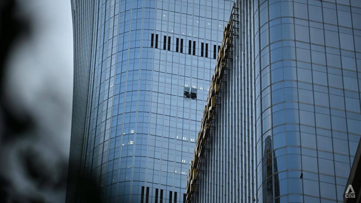 Small Plane Hits CITIC Tower in Beijing; Roads Sealed, Cause and Casualties Unknown