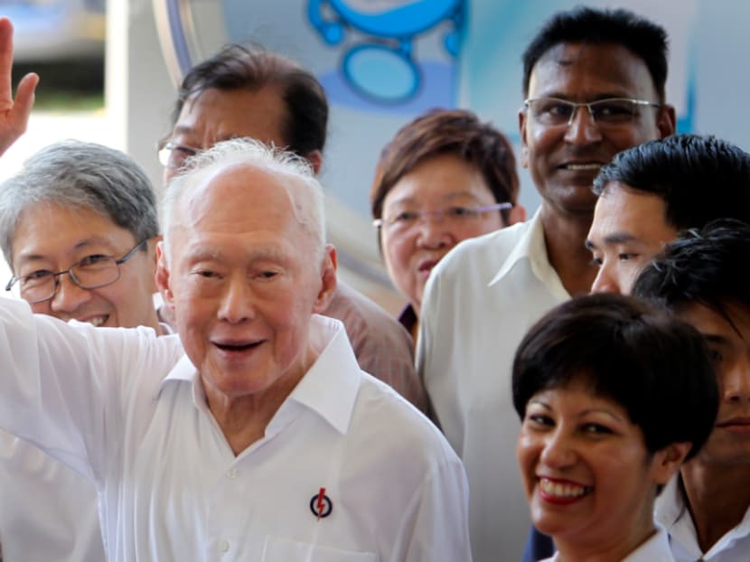 In this April 27, 2011, file photo, Singapore's then Minister Mentor Lee Kuan Yew waves to supporters as he arrives at an elections nomination center in Singapore. Photo: AP In this April 27, 2011, file photo, Singapore's then Minister Mentor Lee Kuan Yew waves to supporters as he arrives at an elections nomination center in Singapore. Photo: AP