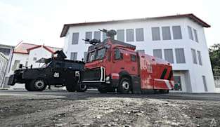 Singapore police unveils new tactical strike vehicles and water cannon fleet