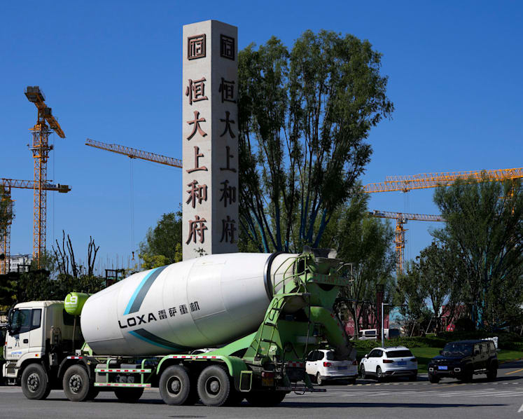 China tries to reassure on Evergrande as default fears rise