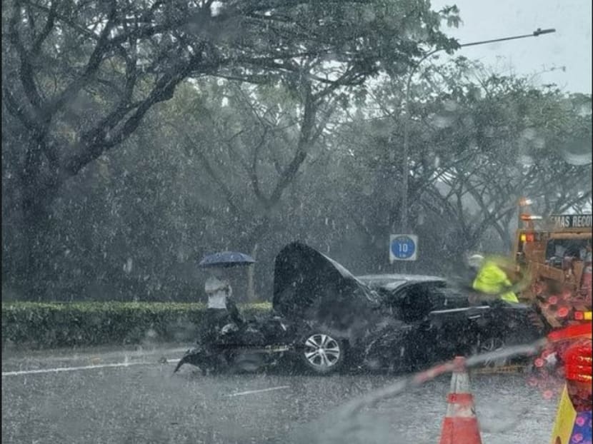 A photo from Facebook group SG Road Vigilante showing a black car with a crushed bonnet along the KPE on July 19, 2023.