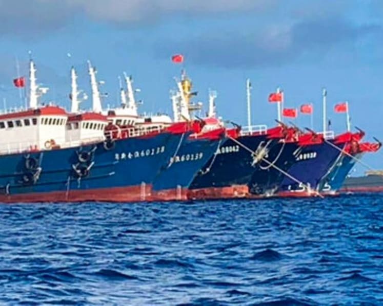 Philippines summons Chinese ambassador over reef dispute 