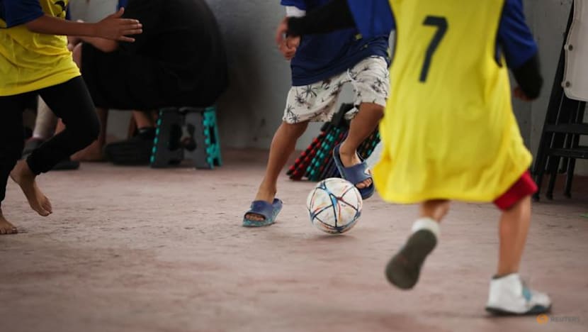 Far from home, migrant children kick off own World Cup in Mexico