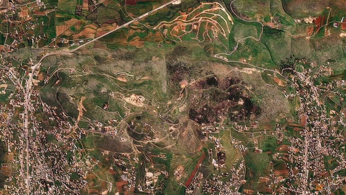 A file satellite image shows damage at the Ali al-Taher ridge near Nabatiah, Lebanon, on March 8, 2026. (Photo: 2026 Planet Labs PBC/Handout via REUTERS)