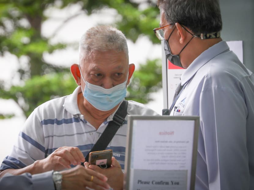 Tan Hwee Koon (left) outside the State Courts on March 10, 2022.