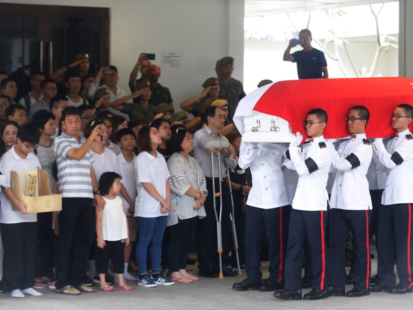 Soldiers carrying the coffin of full-time national serviceman Dave Lee Han Xuan into the hall at Mandai Crematorium on Saturday (May 5) during his military funeral. Soldiers carrying the coffin of full-time national serviceman Dave Lee Han Xuan into the hall at Mandai Crematorium on Saturday (May 5) during his military funeral.