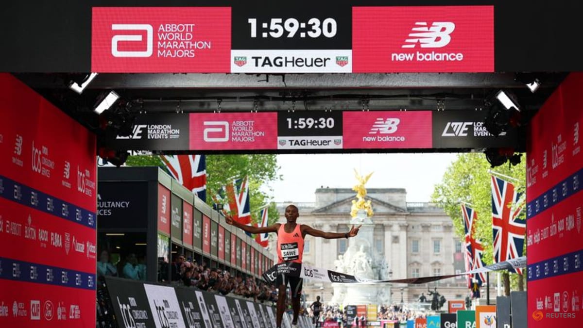 Marathon-Kenya's Sawe becomes first man to run marathon under two hours to win in London