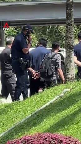 Handcuffed man seen at St Joseph’s Church, police examining car