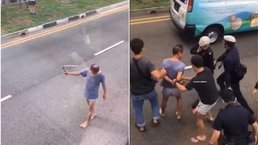 Elderly man arrested after using hammer to hit passing vehicles