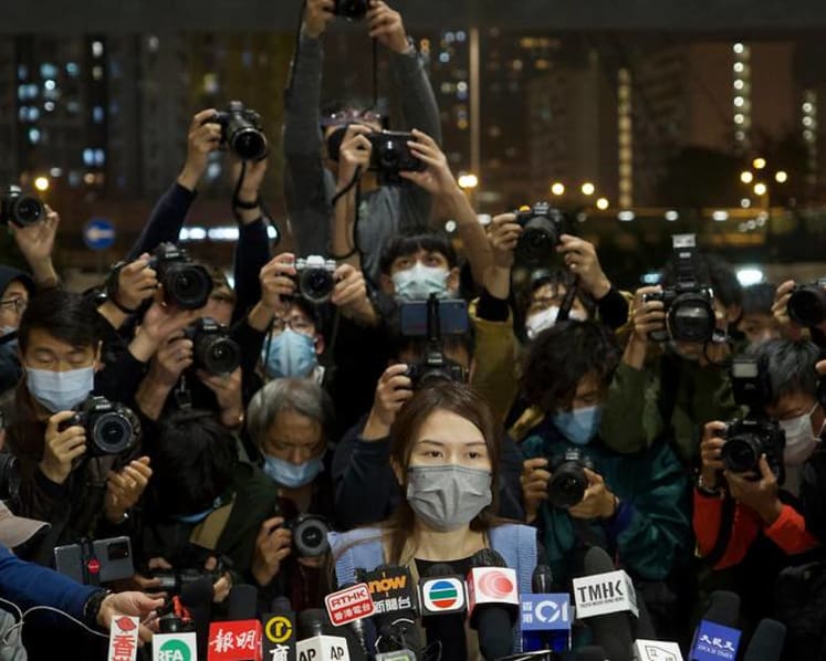 Hong Kong court puts off release of activists