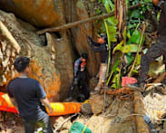 Search continues for 7 villagers trapped in flooded Laos cave
