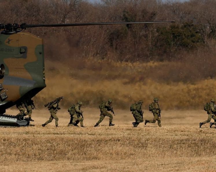 Japan, alarmed by China’s regional activities, fortifies southwest islands and hikes defence budget