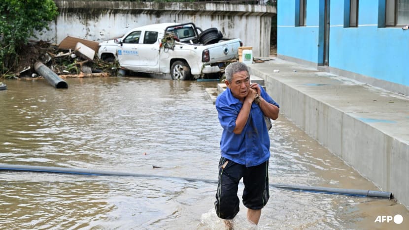 Beijing evacuates residents, expands storm alert as deadly floods keep city on edge  