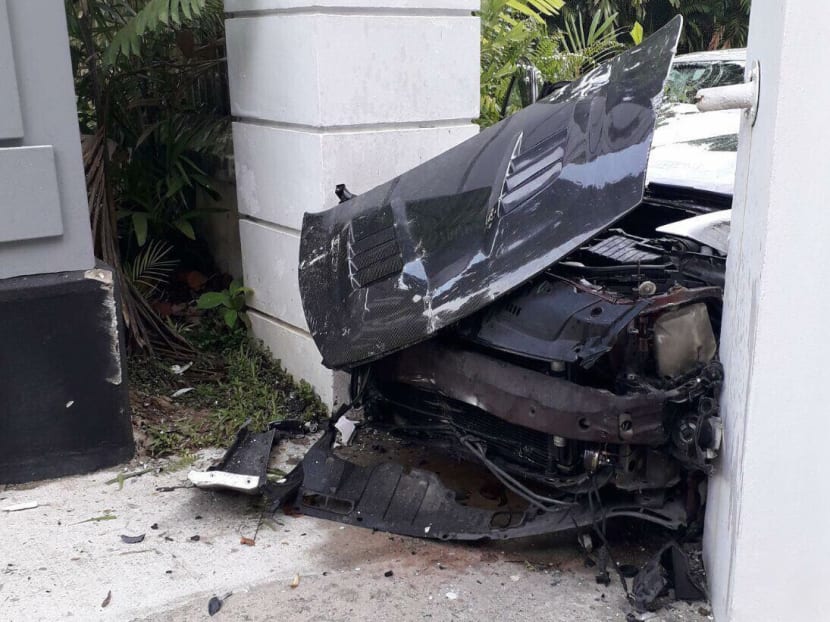 Two people were killed while another is hospitalised when the car (pictured) they were in crashed into a pillar at the Istana on Saturday (Dec 16) morning. Photo: Social media