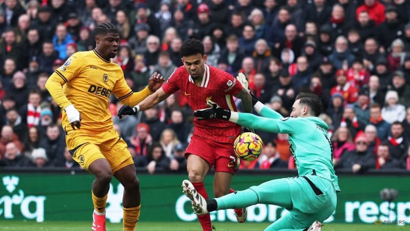 Liverpool edge past Wolves to go seven points clear at top