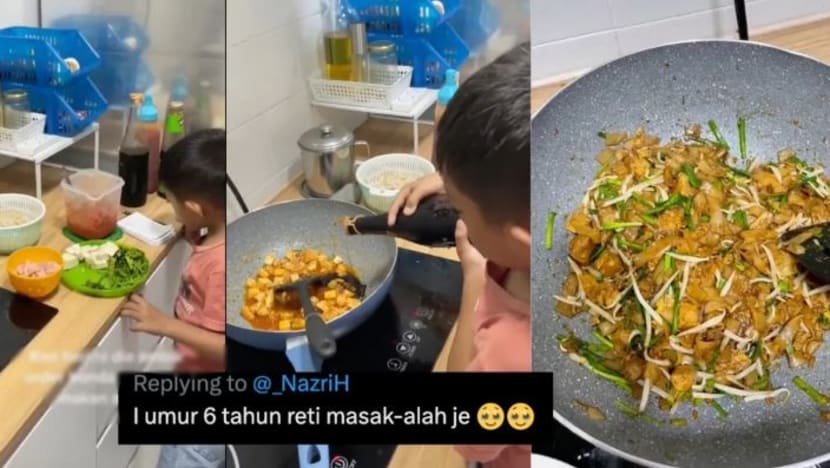 Budak lelaki ini raih pujian warganet, pandai masak char kuey teow