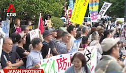 Japan protest: Demonstrators rally against shift away from country's post-war pacifist stance 