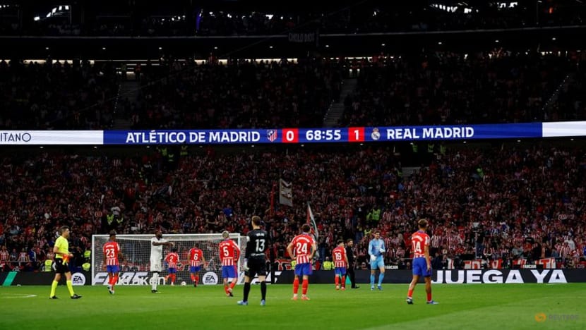 Atletico ban spectator who threw object during interrupted Madrid derby Atletico ban spectator who threw object during interrupted Madrid derby