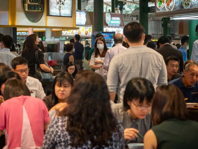Officer workers at Lau Pa Sat food centre about noon on April 26, 2022. Officer workers at Lau Pa Sat food centre about noon on April 26, 2022.