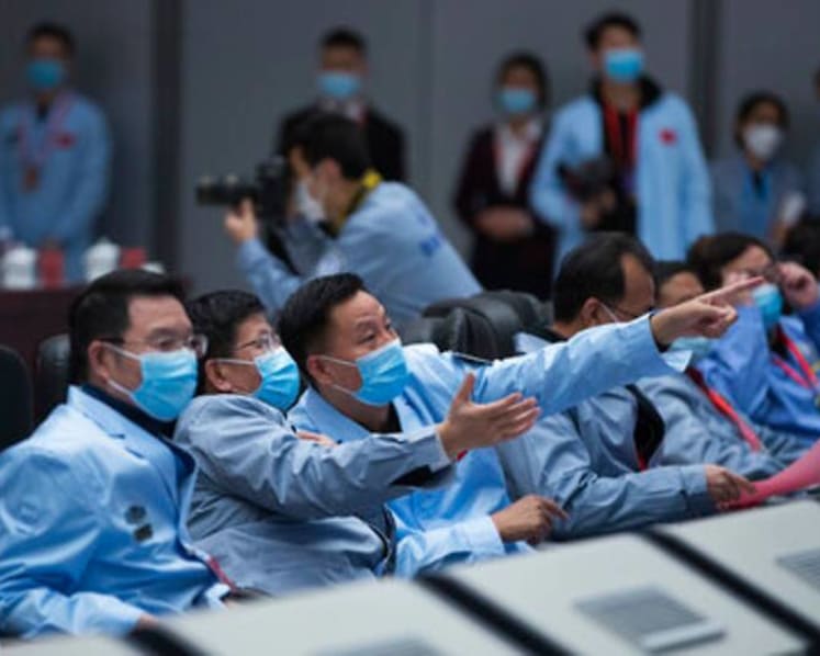 Chinese probe orbiting moon with Earth-bound samples