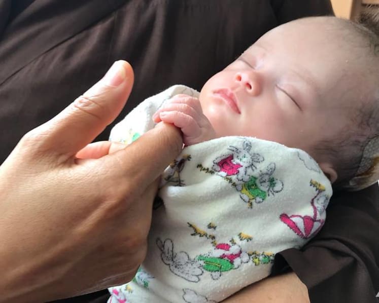 A 30-day miracle: Baby abandoned in plastic bag in Vietnam fights for her life in Singapore hospital