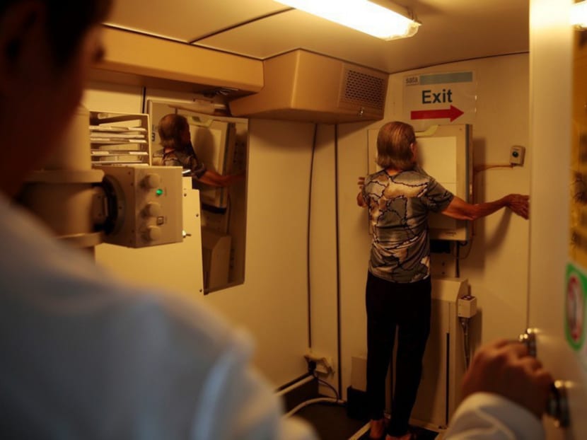 Residents and former residents of Blk 203, Ang Mo Kio Ave 3, get screened for TB. Photo: Jason Quah/TODAY
