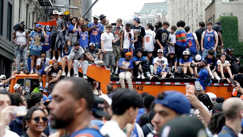 Euphoric Knicks fans flood New York for championship ticker-tape parade