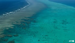 China says intercepted Philippine ships at disputed South China Sea shoal