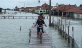 Deserted villages, power cuts: Java’s sinking coast hits residents hard, as Prabowo plans 700km sea wall