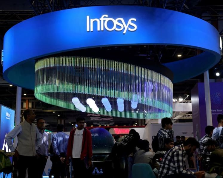 Indian IT firms face subdued fourth quarter as war, AI concerns persist; weak rupee helps earnings