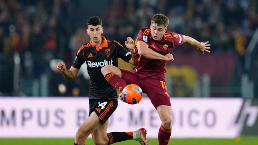 Roma remain in title hunt with 1-0 win over Como