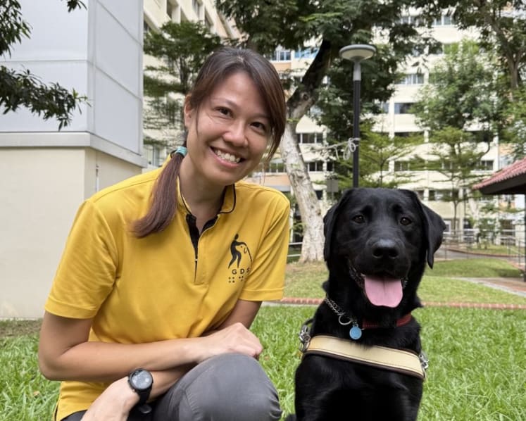She trains guide dogs in Singapore so blind people can get around independently and confidently