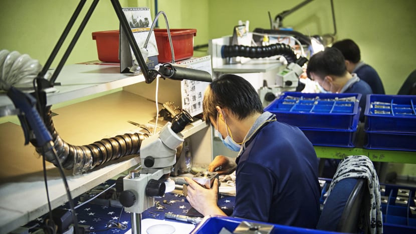 Singapore's manufacturing output jumps 13% in June, beating forecast