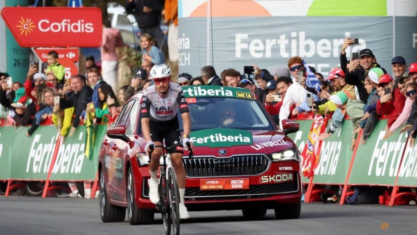 Australian Vine solos to Vuelta stage six win, Traeen takes red jersey