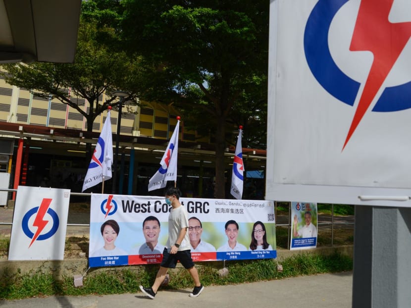 A pedestrian walking by a People's Action Party banner in West Coast Group Representation Constituency during the General Election campaign in 2020. A pedestrian walking by a People's Action Party banner in West Coast Group Representation Constituency during the General Election campaign in 2020.