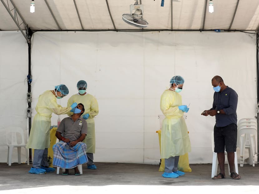 Swab tests being carried out at Westlite Papan dormitory in Jurong on April 21, 2020.
