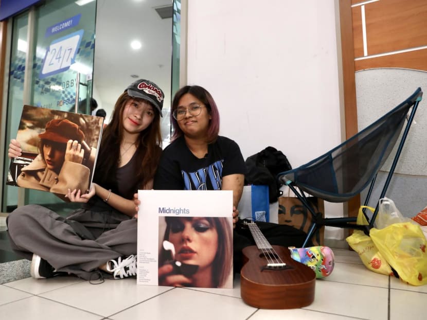 21-year-old Casey James (right) was the first in line at Sengkang Central post office on July 6, 2023. 21-year-old Casey James (right) was the first in line at Sengkang Central post office on July 6, 2023.