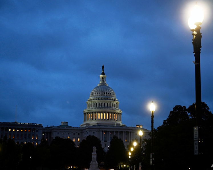 Federal government shutdown grinds into a second week, but quiet talks emerging