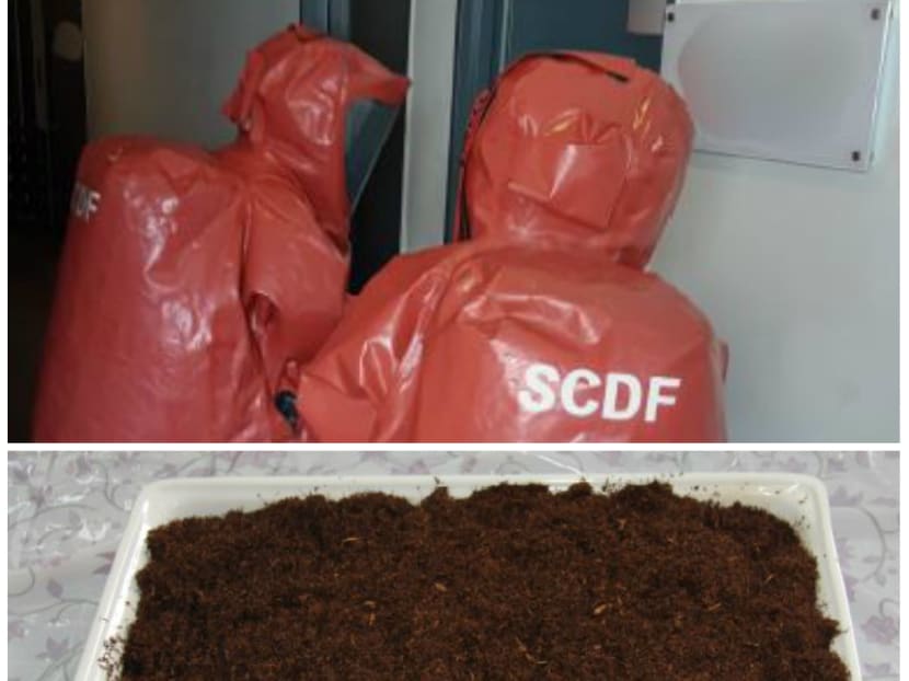 SCDF HazMat specialists were called in to assist in an anti-drug bust in Yishun after CNB officers stumbled upon an illegal drug lab. Photos: Central Narcotics Bureau