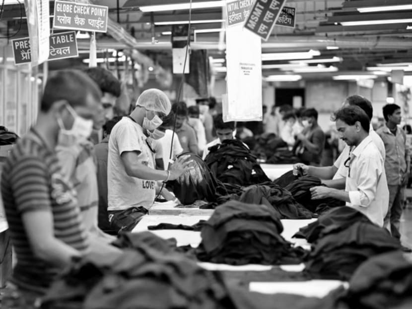 Staff working at a garment factory on the outskirts of New Delhi. Considering overall costs, India is only 5 per cent cheaper for manufacturing than Mexico. Photo:  REUTERS