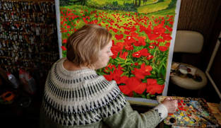 Olympics 'look surreal' from Ukraine, artist behind war dead helmet says