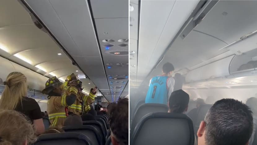 Spirit Airlines flight diverted after battery fire in overhead bin Spirit Airlines flight diverted after battery fire in overhead bin