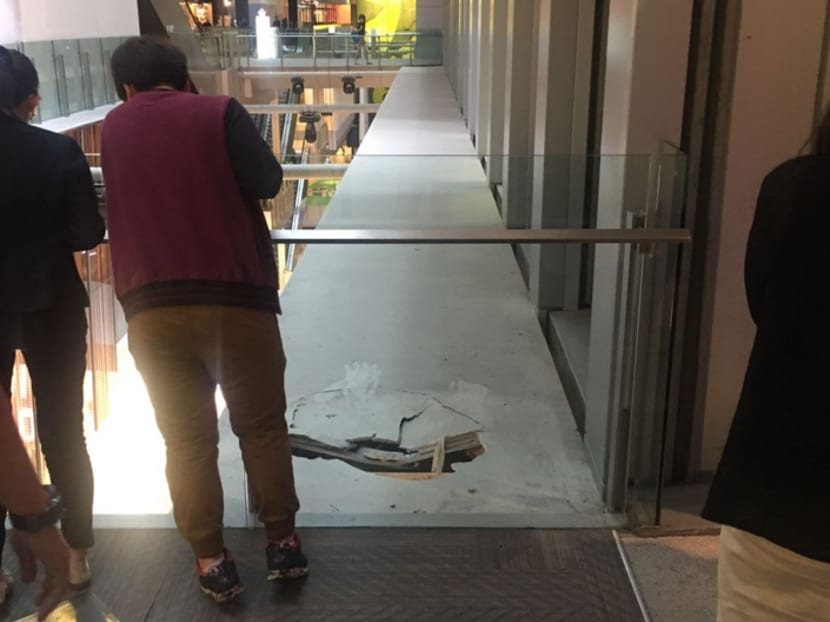 A damaged parapet is seen in Orchard Central, where a teen fell from the fourth floor, on Feb 24, 2017. Photo courtesy of Alvin Yow