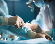 Doctor accused of causing patient's death by cutting wrong arteries restricted from surgery for 18 months