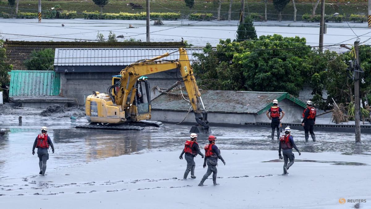 Taiwan rescuers battle thick mud to look for missing from Super Typhoon Ragasa