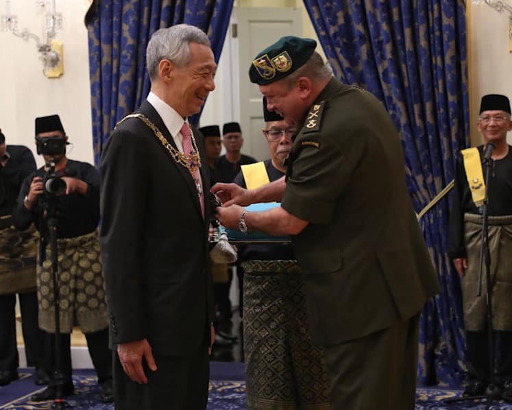 PM Lee Hsien Loong, Ho Ching receive awards from Johor Sultan