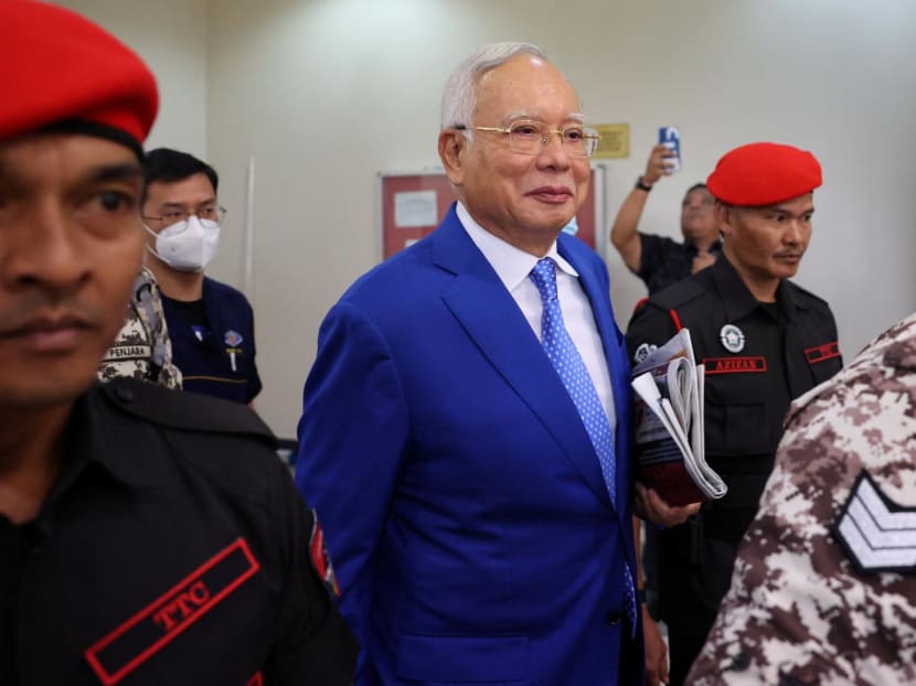 Former Malaysian Prime Minister Najib Razak escorted by prison officers as the jailed politician left the court after court proceedings in Kuala Lumpur, Malaysia on Jan 19, 2024. 